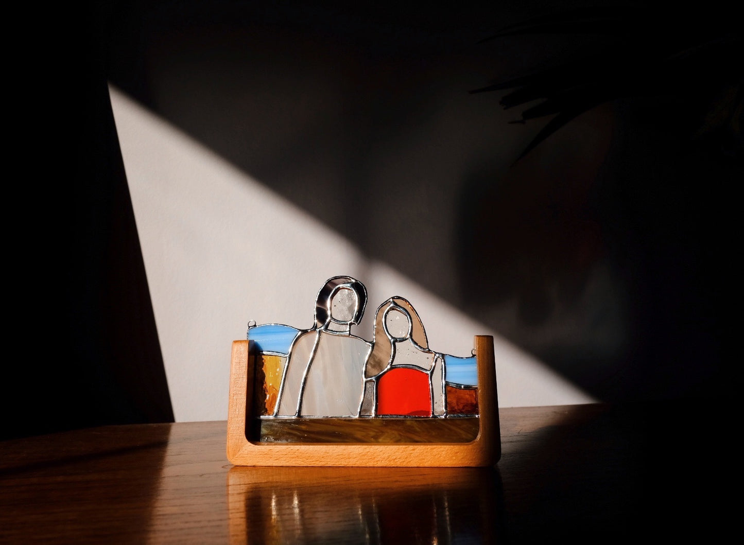 Couple in Wooden Stand / Reserved