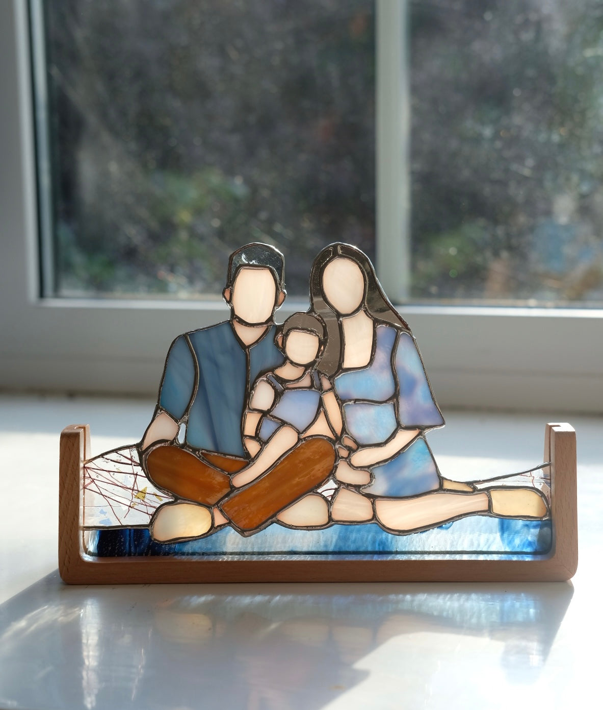Family of Three in Blue / Reserved